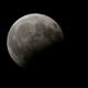 The rising moon is seen during a partial lunar eclipse over Beirut, Lebanon.